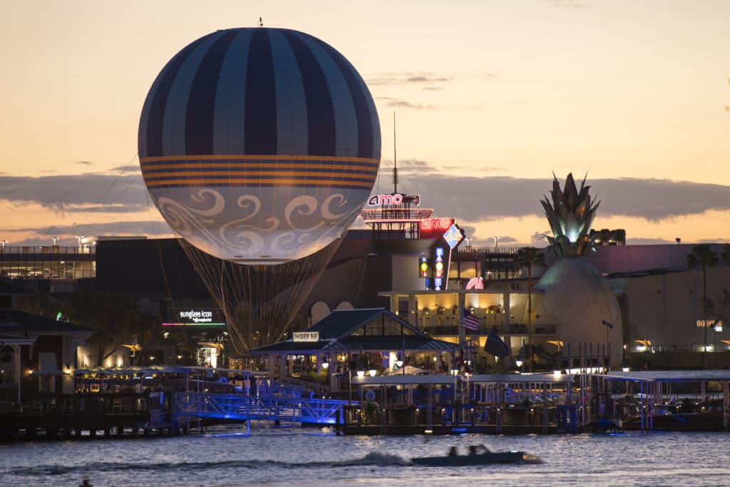 Characters in Flight balloon soars above Disney Springs in Lake Buena Vista, Fla. The tethered helium balloon features a fresh design inspired by the springs and the element of water. From 400 ft. up in the air, guests get a breathtaking 360-degree view of Walt Disney World Resort for approximately 8 - 10 minutes. The daily hours of operation are 8:30 a.m. to midnight, weather permitting. (David Roark, photographer)